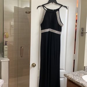 Formal wear size 8-10.  Colors of the two dresses are black and royal blue.